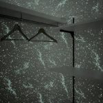 【収納（夜）】 ウォークインクローゼットの壁紙は暗闇で光る蓄光壁紙を使用。銀河のような空間を演出します。遊び心がいっぱいのリノベーションを現地でご覧ください。